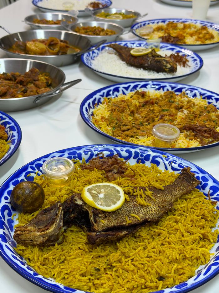 Fish machboos on spiced saffron rice with lemon